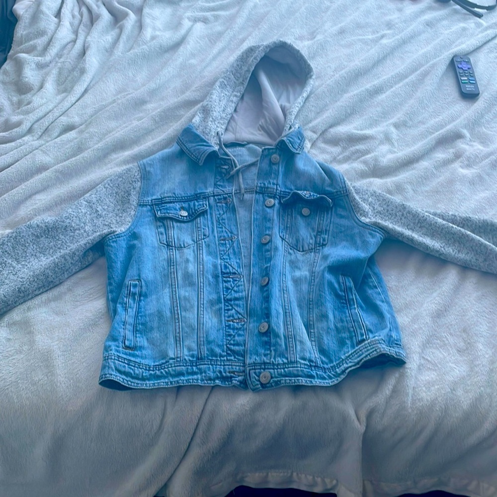 This is a aeropostal jean jacket with fuzzy cloth sleeves and hood.
